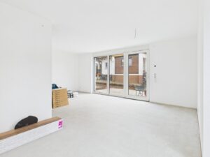 Wohnzimmer mit Zugang zur Terrasse