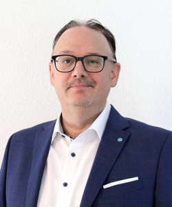 Herr Björn Giesel